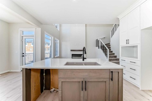 105 Corner Glen Green Ne, Calgary, AB - Indoor Photo Showing Kitchen With Double Sink