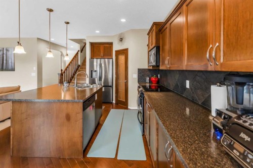 107 Everoak Green Sw, Calgary, AB - Indoor Photo Showing Kitchen With Double Sink