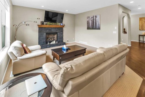107 Everoak Green Sw, Calgary, AB - Indoor Photo Showing Living Room With Fireplace
