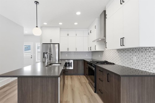 440 Lewiston Landing Ne, Calgary, AB - Indoor Photo Showing Kitchen With Double Sink With Upgraded Kitchen