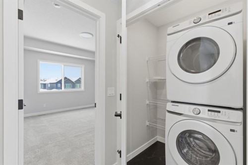 440 Lewiston Landing Ne, Calgary, AB - Indoor Photo Showing Laundry Room