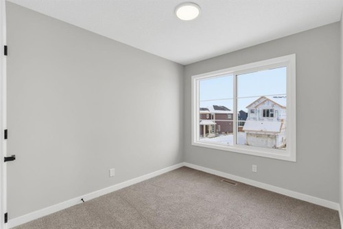 440 Lewiston Landing Ne, Calgary, AB - Indoor Photo Showing Other Room