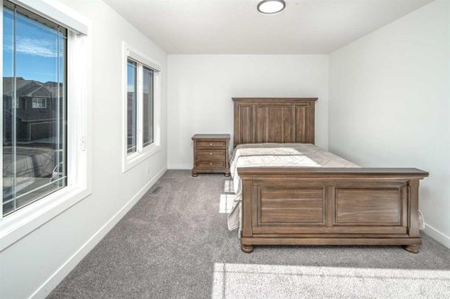 834 Alpine Drive Sw, Calgary, AB - Indoor Photo Showing Bedroom
