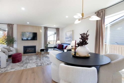 959 Parkwood Way Se, Calgary, AB - Indoor Photo Showing Living Room With Fireplace