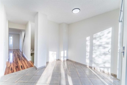 121 Eversyde Point Sw, Calgary, AB - Indoor Photo Showing Other Room