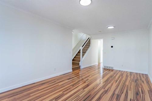 121 Eversyde Point Sw, Calgary, AB - Indoor Photo Showing Other Room