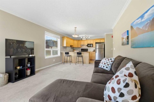 103-128 Centre Avenue, Cochrane, AB - Indoor Photo Showing Living Room