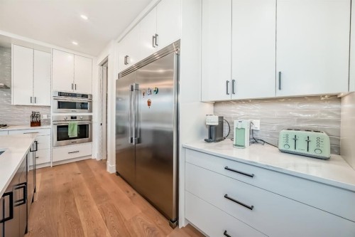 76 Rock Lake View Nw, Calgary, AB - Indoor Photo Showing Kitchen With Stainless Steel Kitchen With Upgraded Kitchen
