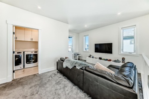 76 Rock Lake View Nw, Calgary, AB - Indoor Photo Showing Living Room