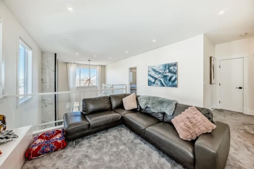 76 Rock Lake View Nw, Calgary, AB - Indoor Photo Showing Living Room