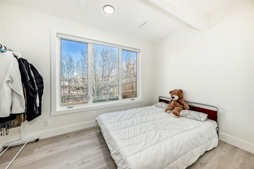 76 Rock Lake View Nw, Calgary, AB - Indoor Photo Showing Bedroom