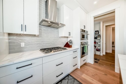 76 Rock Lake View Nw, Calgary, AB - Indoor Photo Showing Kitchen With Upgraded Kitchen