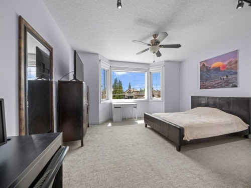 210 Evergreen Mews Sw, Calgary, AB - Indoor Photo Showing Bedroom