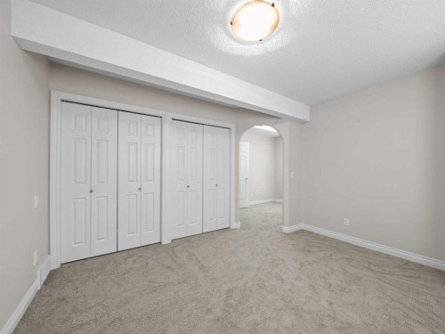 210 Evergreen Mews Sw, Calgary, AB - Indoor Photo Showing Other Room