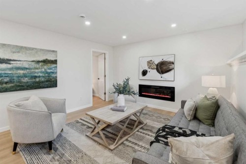 9607 Oakhill Drive Sw, Calgary, AB - Indoor Photo Showing Living Room With Fireplace