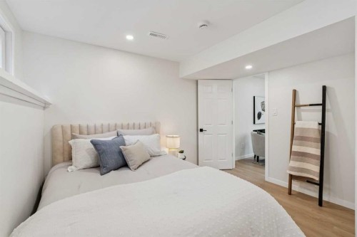 9607 Oakhill Drive Sw, Calgary, AB - Indoor Photo Showing Bedroom
