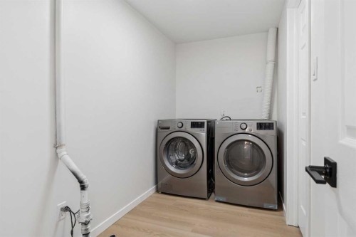 9607 Oakhill Drive Sw, Calgary, AB - Indoor Photo Showing Laundry Room