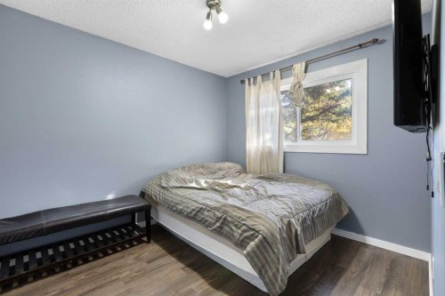 339 Ranchview Place Nw, Calgary, AB - Indoor Photo Showing Bedroom