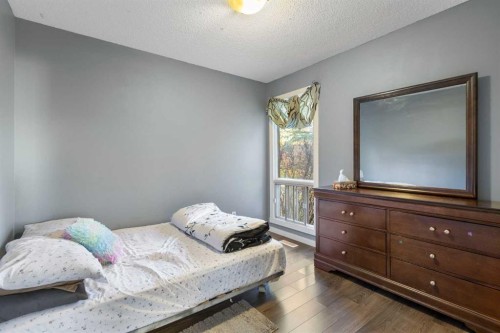 339 Ranchview Place Nw, Calgary, AB - Indoor Photo Showing Bedroom