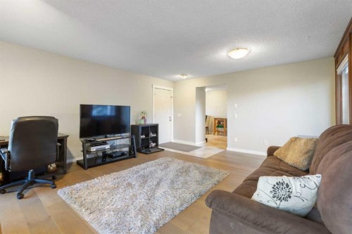 339 Ranchview Place Nw, Calgary, AB - Indoor Photo Showing Living Room