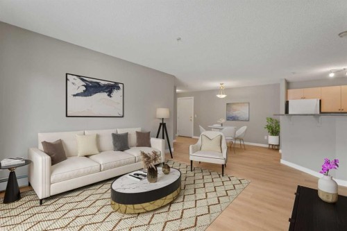 4115-4975 130 Avenue Se, Calgary, AB - Indoor Photo Showing Living Room