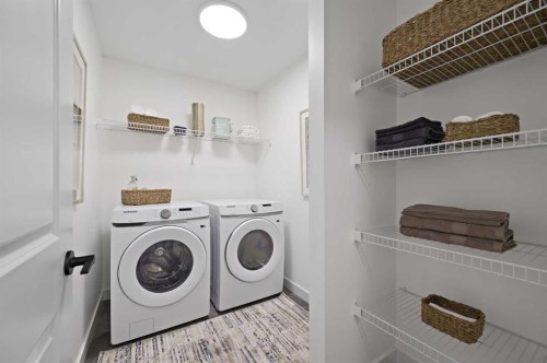 1730 Keystone Creek Avenue, Calgary, AB - Indoor Photo Showing Laundry Room