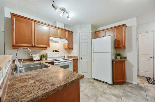 401-1110 17 Street Sw, Calgary, AB - Indoor Photo Showing Kitchen With Double Sink