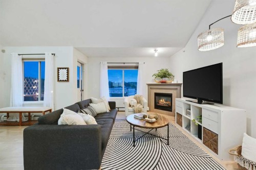 401-1110 17 Street Sw, Calgary, AB - Indoor Photo Showing Living Room With Fireplace