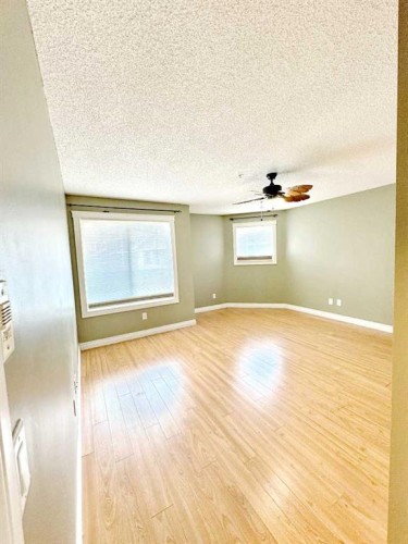 2126-700 Willowbrook Road Nw, Airdrie, AB - Indoor Photo Showing Other Room