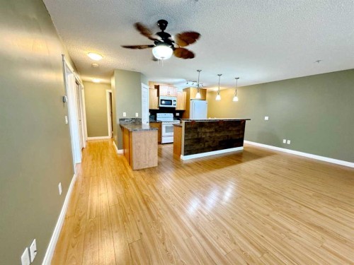 2126-700 Willowbrook Road Nw, Airdrie, AB - Indoor Photo Showing Kitchen