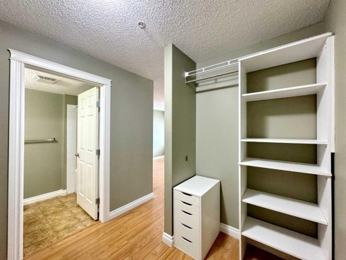 2126-700 Willowbrook Road Nw, Airdrie, AB - Indoor Photo Showing Other Room