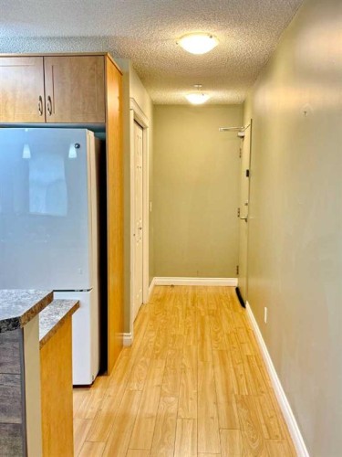 2126-700 Willowbrook Road Nw, Airdrie, AB - Indoor Photo Showing Other Room