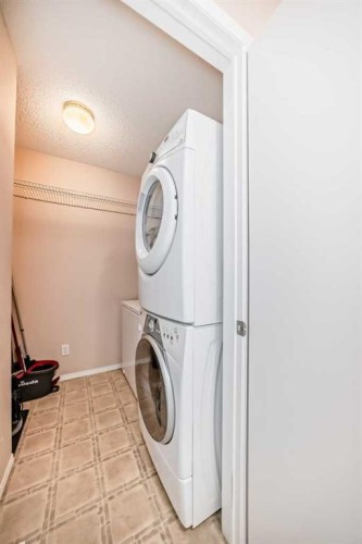 238 Bridleridge Way Sw, Calgary, AB - Indoor Photo Showing Laundry Room