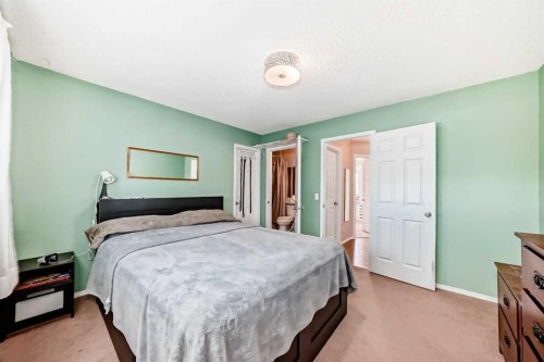 238 Bridleridge Way Sw, Calgary, AB - Indoor Photo Showing Bedroom