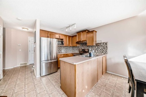 238 Bridleridge Way Sw, Calgary, AB - Indoor Photo Showing Kitchen