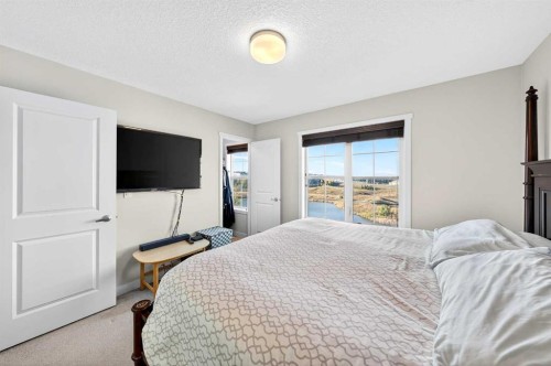 503 Nolanfield Villas Nw, Calgary, AB - Indoor Photo Showing Bedroom