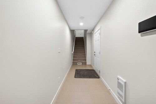503 Nolanfield Villas Nw, Calgary, AB - Indoor Photo Showing Other Room