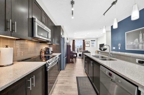 503 Nolanfield Villas Nw, Calgary, AB - Indoor Photo Showing Kitchen With Stainless Steel Kitchen With Double Sink With Upgraded Kitchen