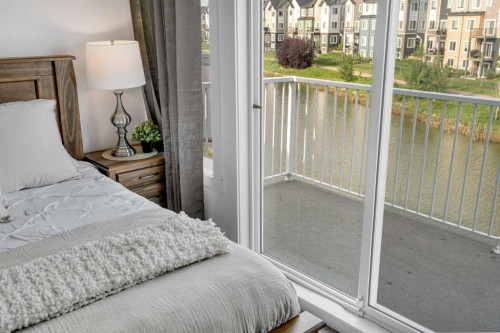 1315 Bayside Drive Sw, Airdrie, AB - Indoor Photo Showing Bedroom