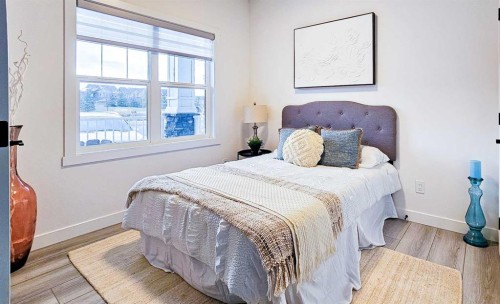 1315 Bayside Drive Sw, Airdrie, AB - Indoor Photo Showing Bedroom
