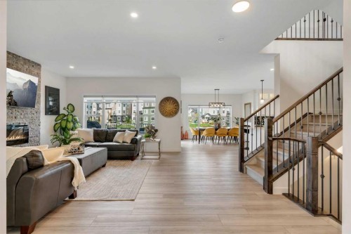 1315 Bayside Drive Sw, Airdrie, AB - Indoor Photo Showing Living Room With Fireplace