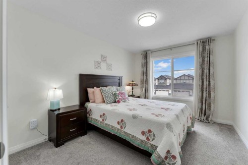 838 Edgefield Street, Strathmore, AB - Indoor Photo Showing Bedroom