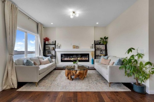 838 Edgefield Street, Strathmore, AB - Indoor Photo Showing Living Room With Fireplace