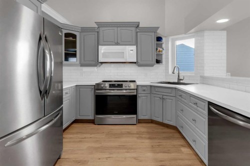 3 Aspen Landing, Strathmore, AB - Indoor Photo Showing Kitchen With Upgraded Kitchen