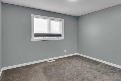 3 Aspen Landing, Strathmore, AB - Indoor Photo Showing Other Room