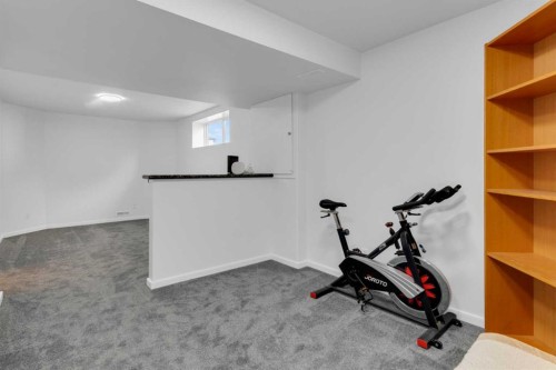 3 Aspen Landing, Strathmore, AB - Indoor Photo Showing Gym Room