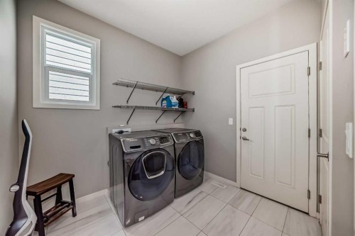 226 West Grove Point Sw, Calgary, AB - Indoor Photo Showing Laundry Room