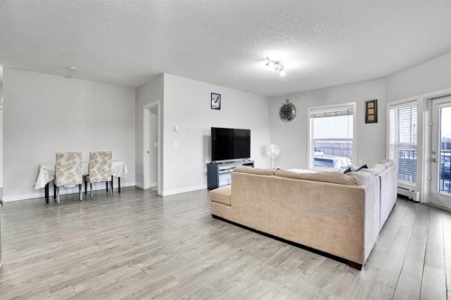 102-3 Taracove Estate Drive Ne, Calgary, AB - Indoor Photo Showing Living Room