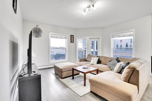 102-3 Taracove Estate Drive Ne, Calgary, AB - Indoor Photo Showing Living Room