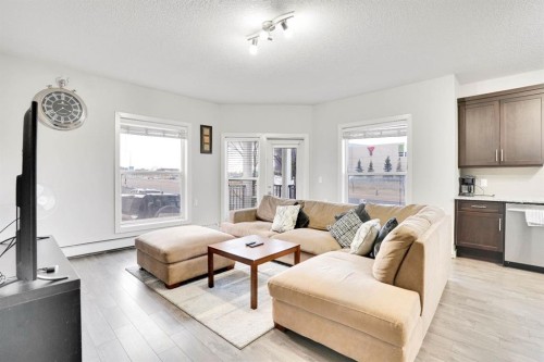 102-3 Taracove Estate Drive Ne, Calgary, AB - Indoor Photo Showing Living Room